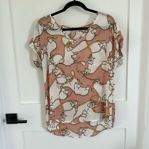 Think travel. Como Blu V-neck blouse